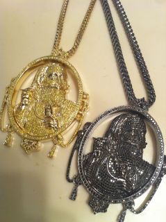 WIZ KHALIFA ROCKS BOTH OF THESE PENDANTS AND CHAINS TOGETHER IN
