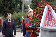 Russian President Dmitry Medvedev laying a wreath at a monument to