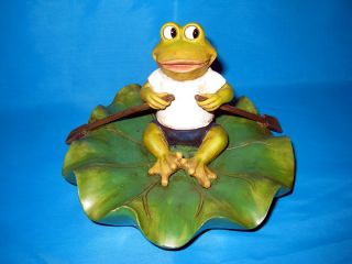 The Rowing Frog measures 7 inches wide from the edge of the lily pad