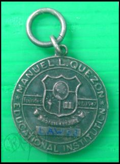 Description 1953 Manuel L. Quezon Medal Educational Institution for