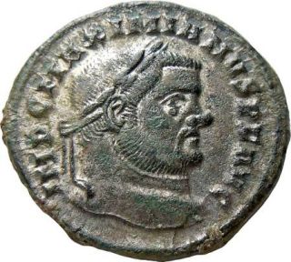Maximian AE Follis Genius holding patera & cornucopia. Star Roman Coin